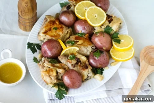 Bunch of food on a white plate sitting on a table