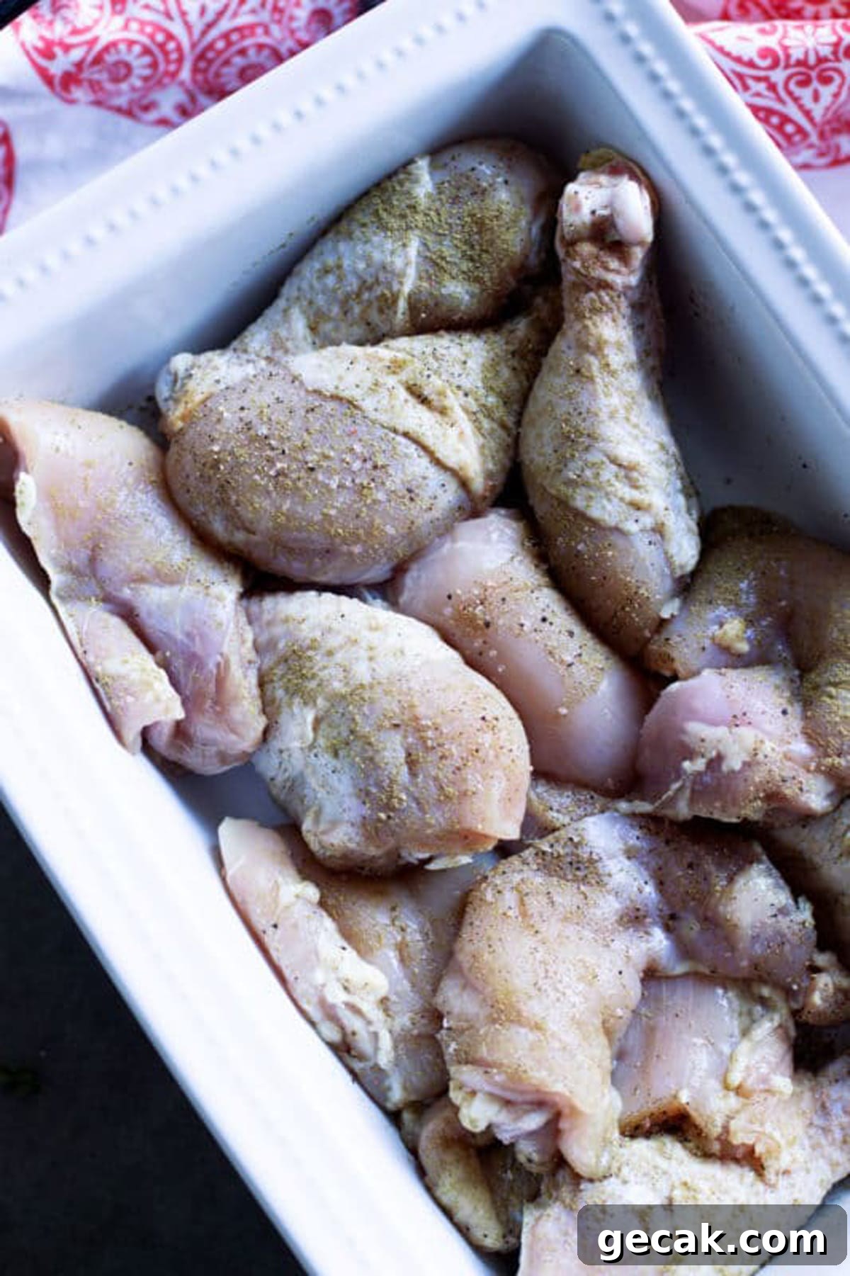 Thighs and drumsticks seasoned with poultry seasoning, salt, and pepper.