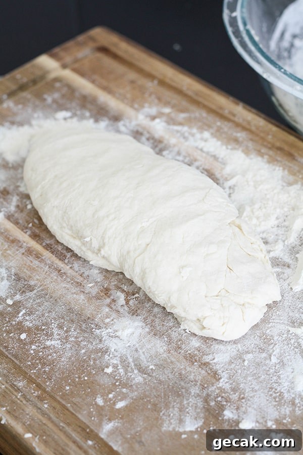 two ingredient dough on a wooden cutting board.