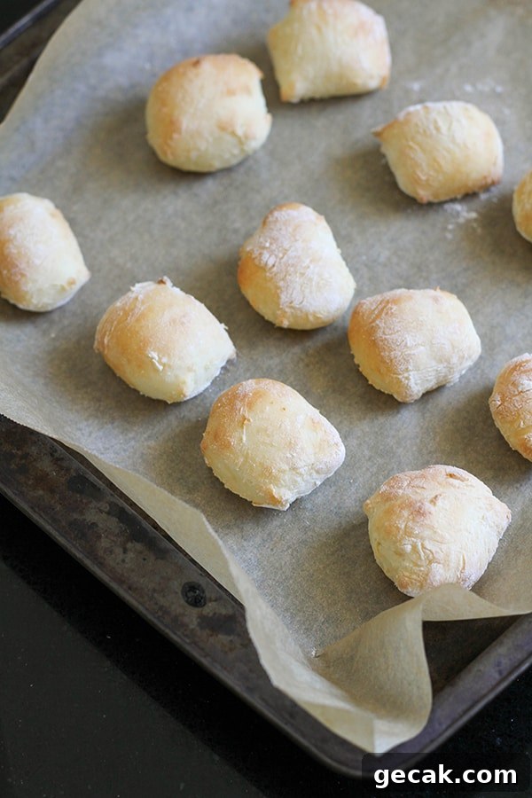 cooked pretzel bites on a baking tray. 