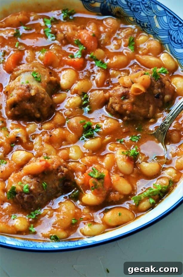 Sausage and Beans stew garnished with parsley