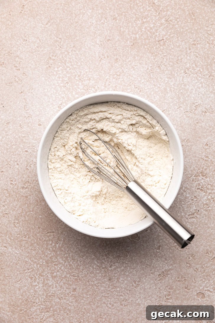 Whisk in a bowl of flour.