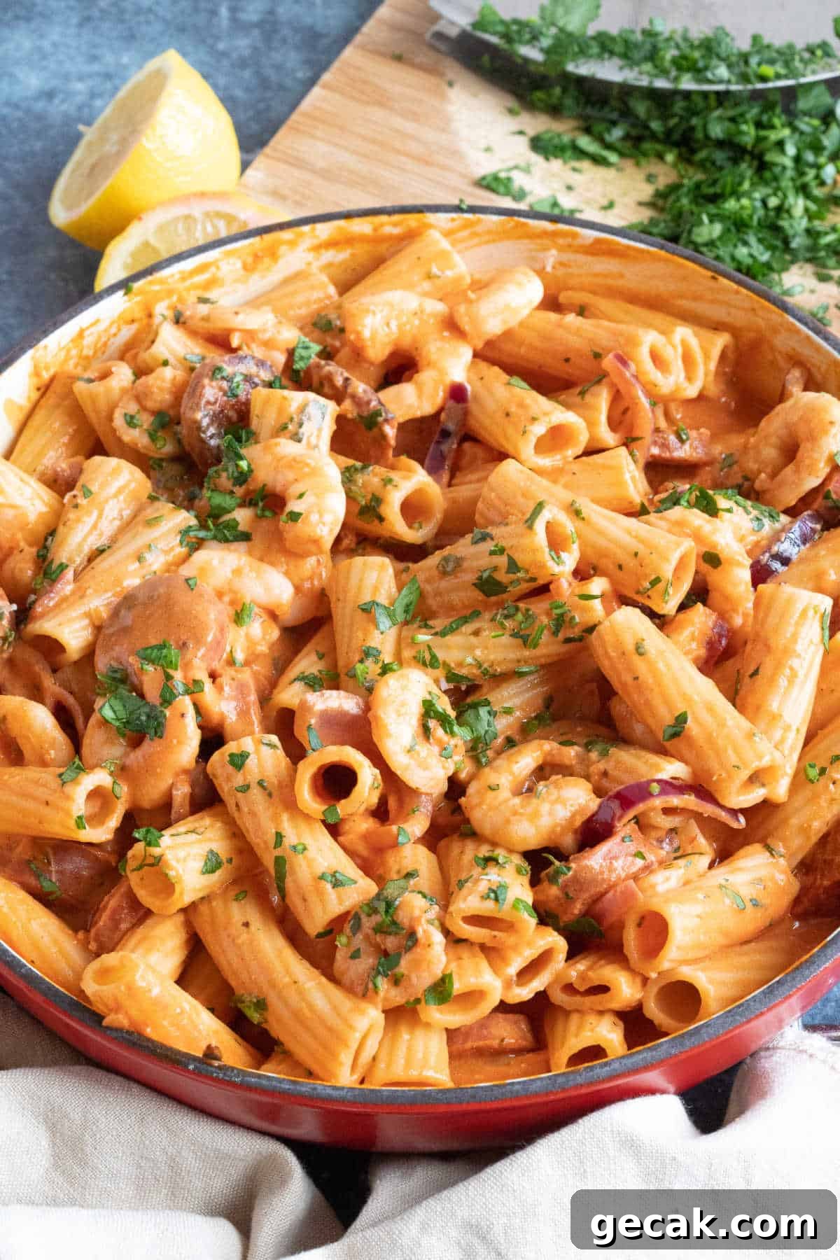 Creamy chorizo and prawn pasta in a pan.