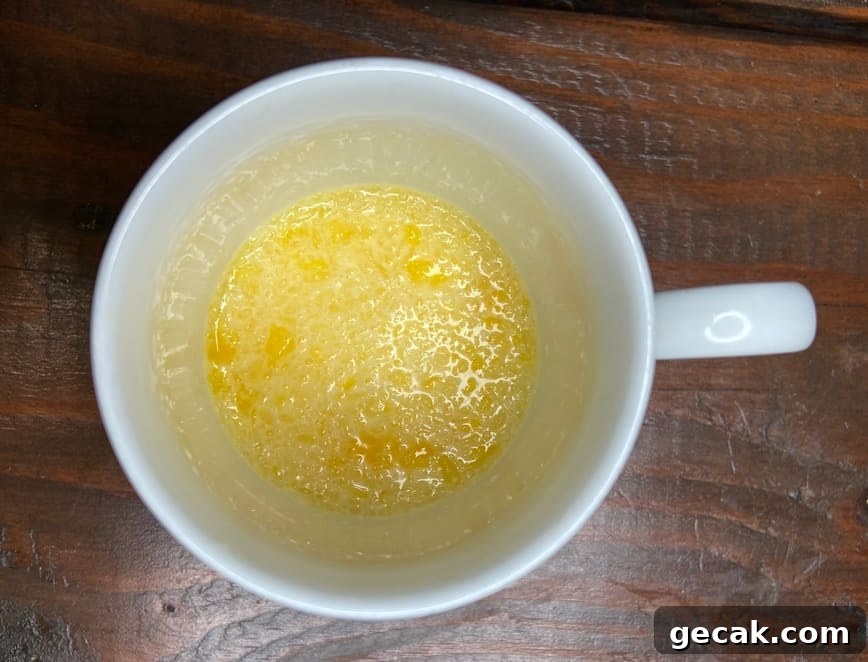 Melted butter in a mug.