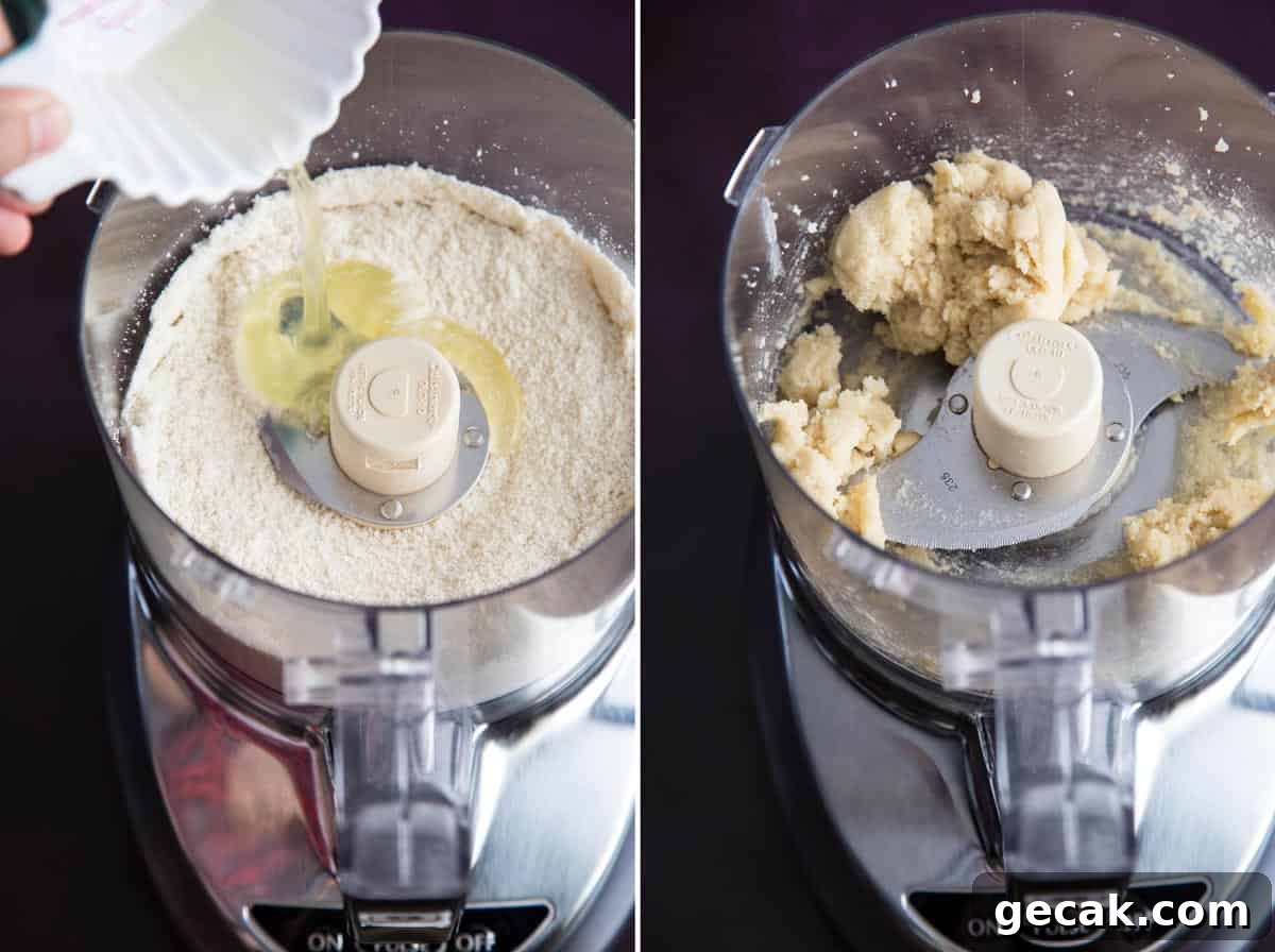 Mixing dry ingredients with egg white to make almond paste in a food processor.
