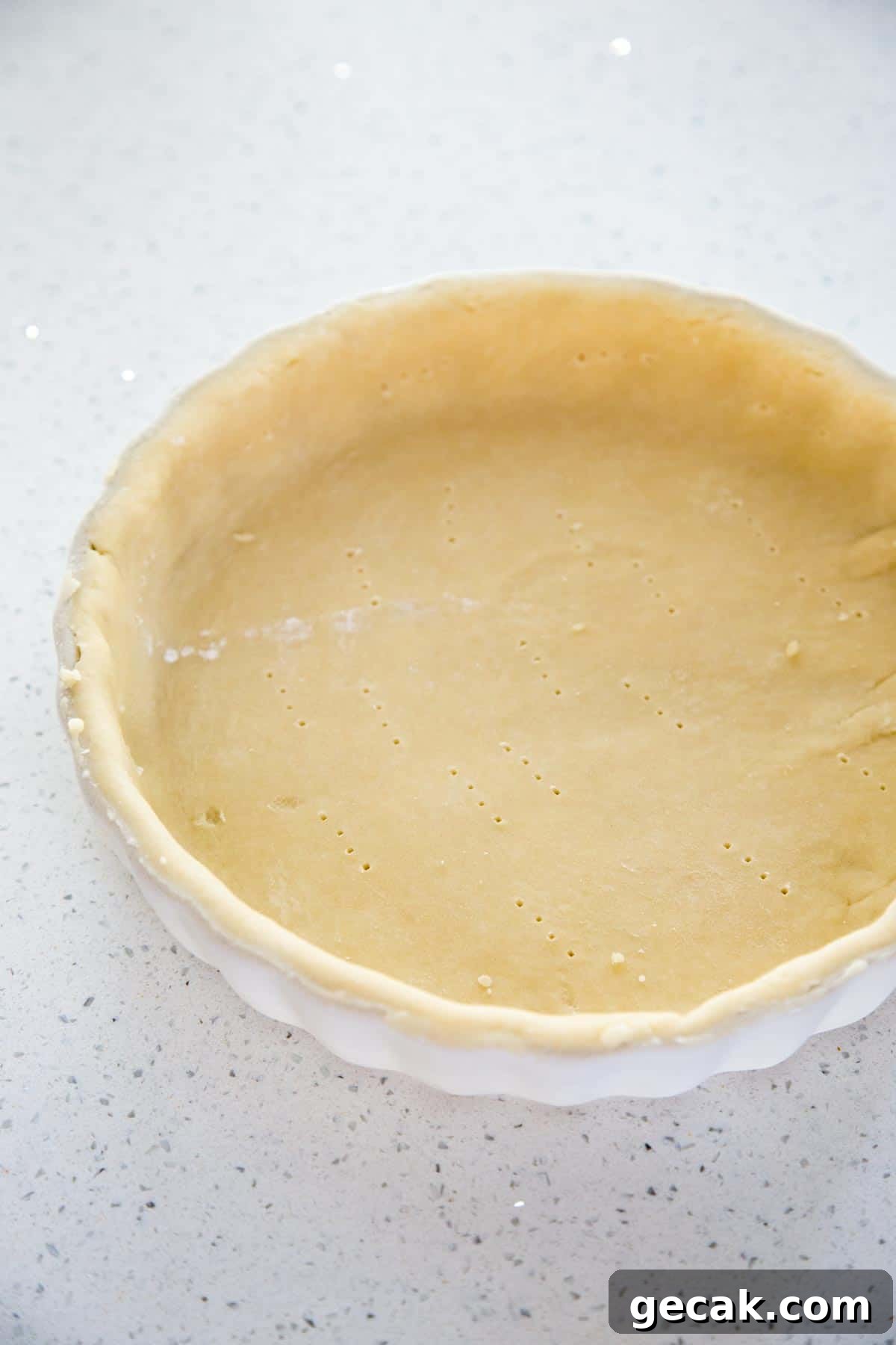 An unbaked tart crust.