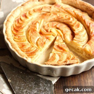 A closeup image of my easy apple tart recipe with a silver pie server to the side.