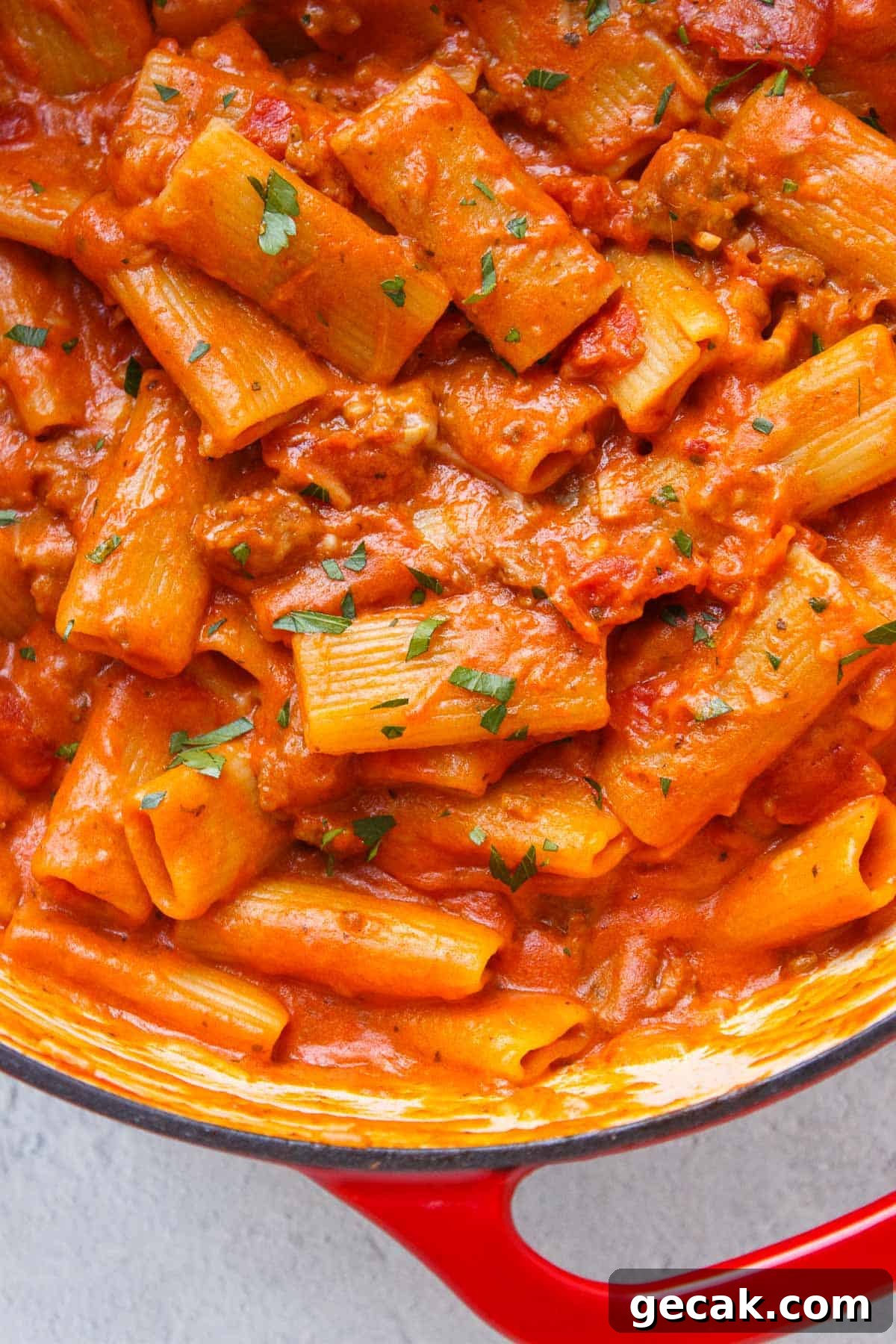 Creamy One Pot Rigatoni garnished with fresh basil