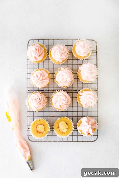 rack of frosted rhubarb cupcake