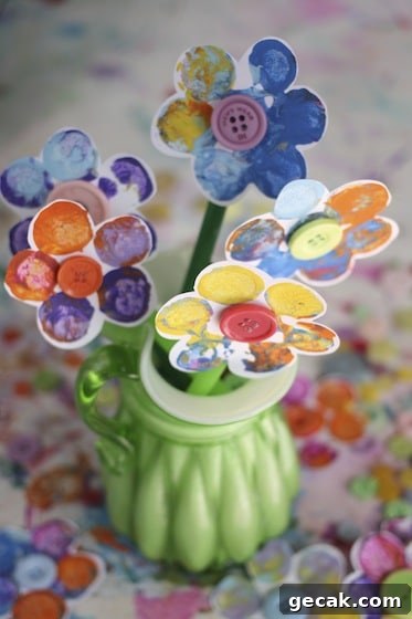 vase displaying stamped flowers