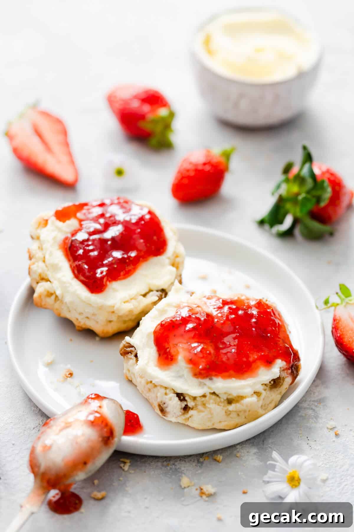Homemade Strawberry Jam Recipe: Small-Batch Method for Fresh Flavor 4 side close up at scone with strawberry jam and cream