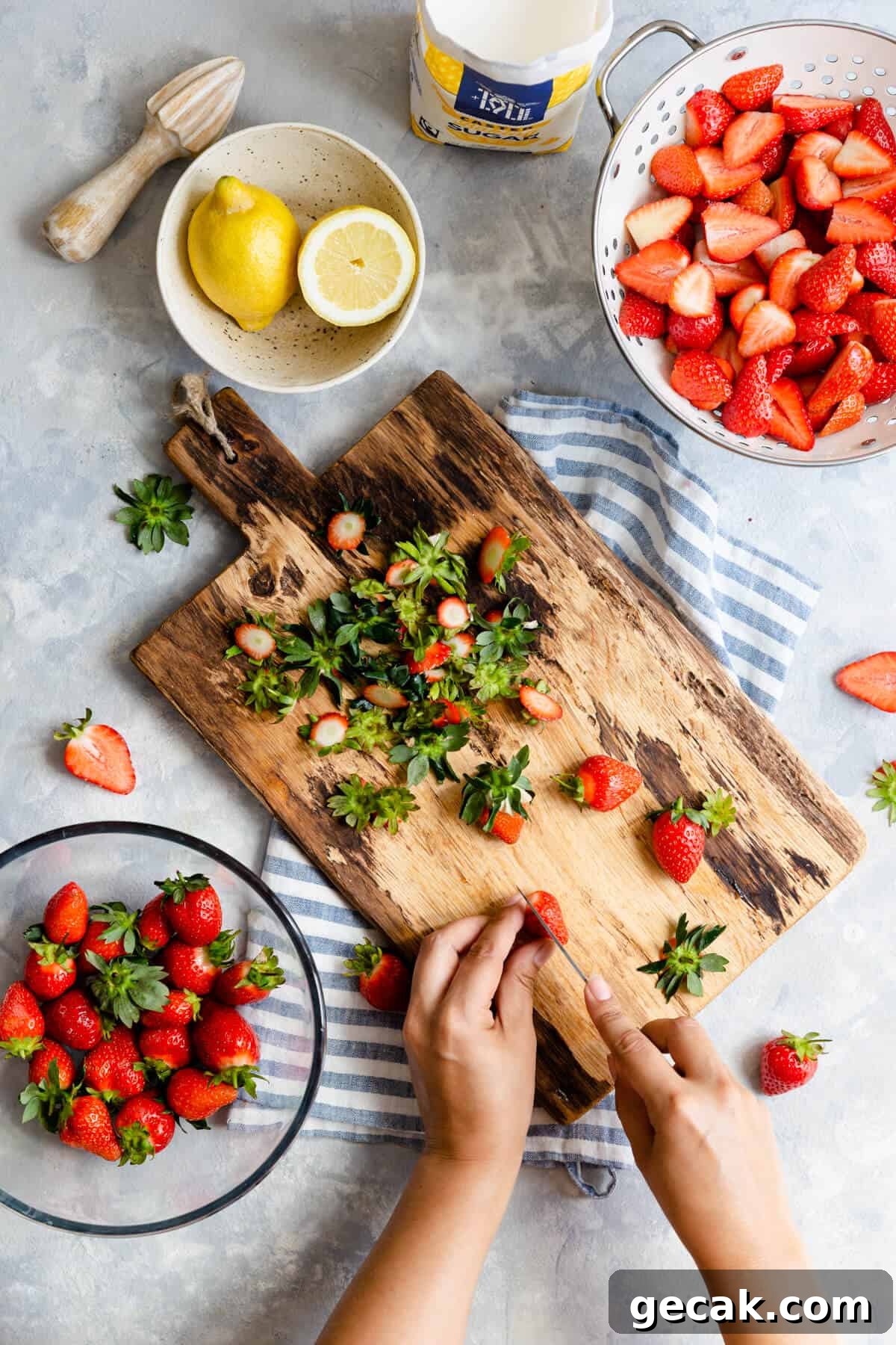 Homemade Strawberry Jam Recipe: Small-Batch Method for Fresh Flavor 10 overhead shot of a person slicing strawberries on a chopping board
