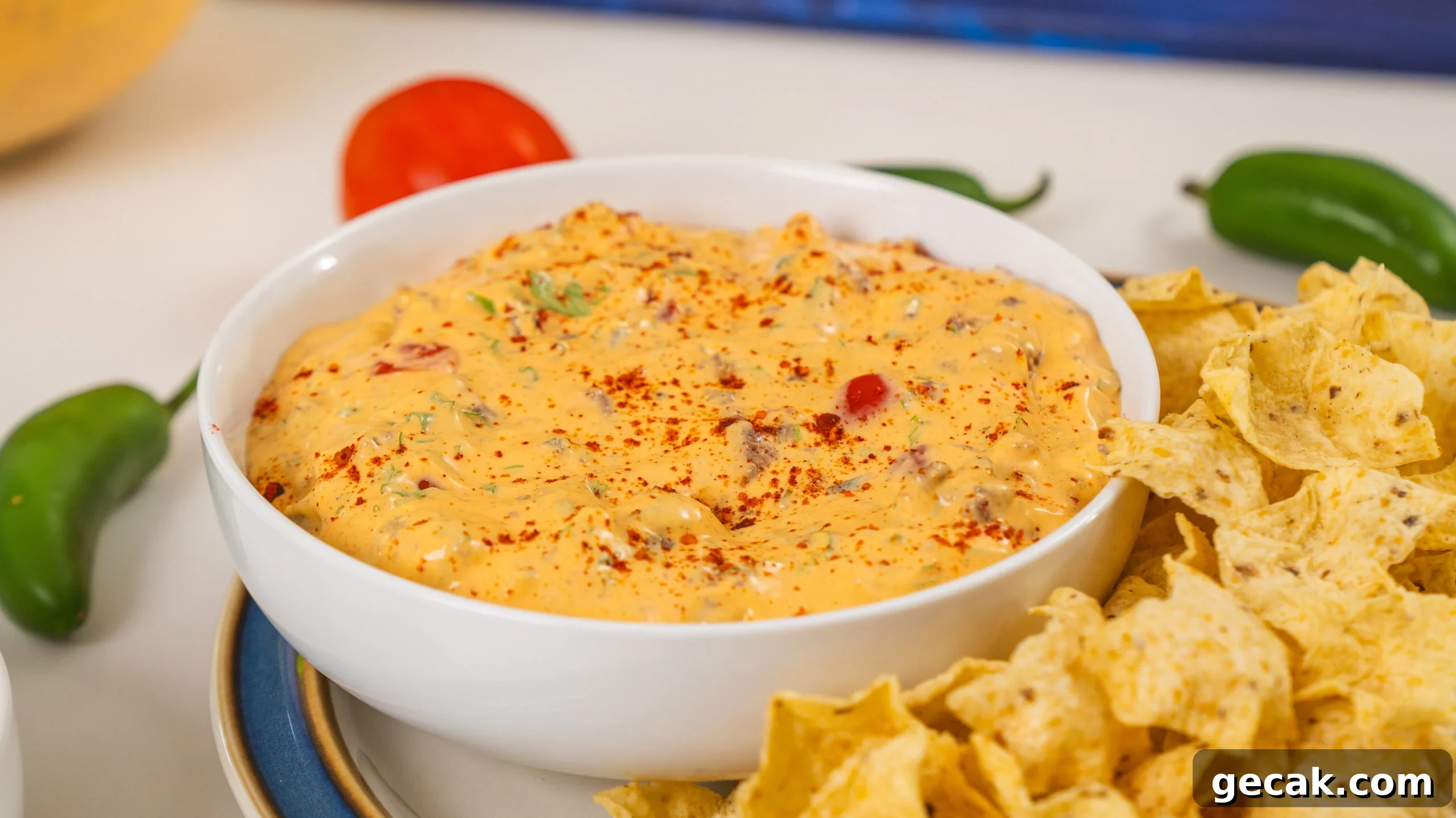 One of the best queso dip recipes out there: a mix of cottage cheese and taco seasoning and tasty toppings.