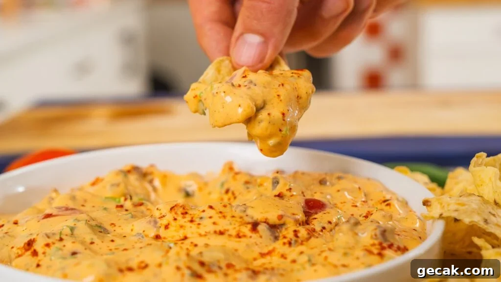 close up of chip scooping dip
