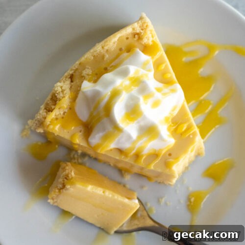 slice of no bake passionfruit cheesecake on a small plate from overhead
