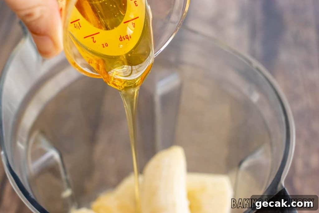 honey being added to blender
