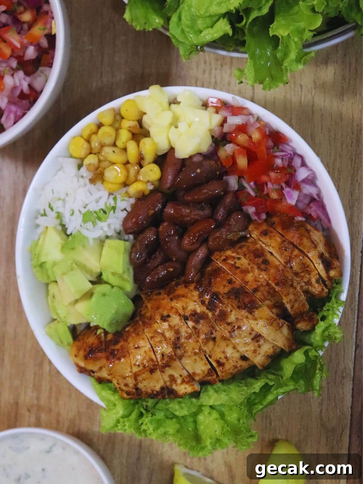 image of chicken fajita rice bowl in the center.