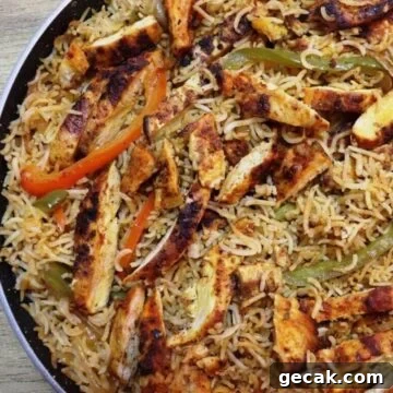 chicken fajita and rice in a skillet.