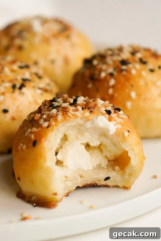 cream cheese stuffed everything bagel bite with a bite taken out