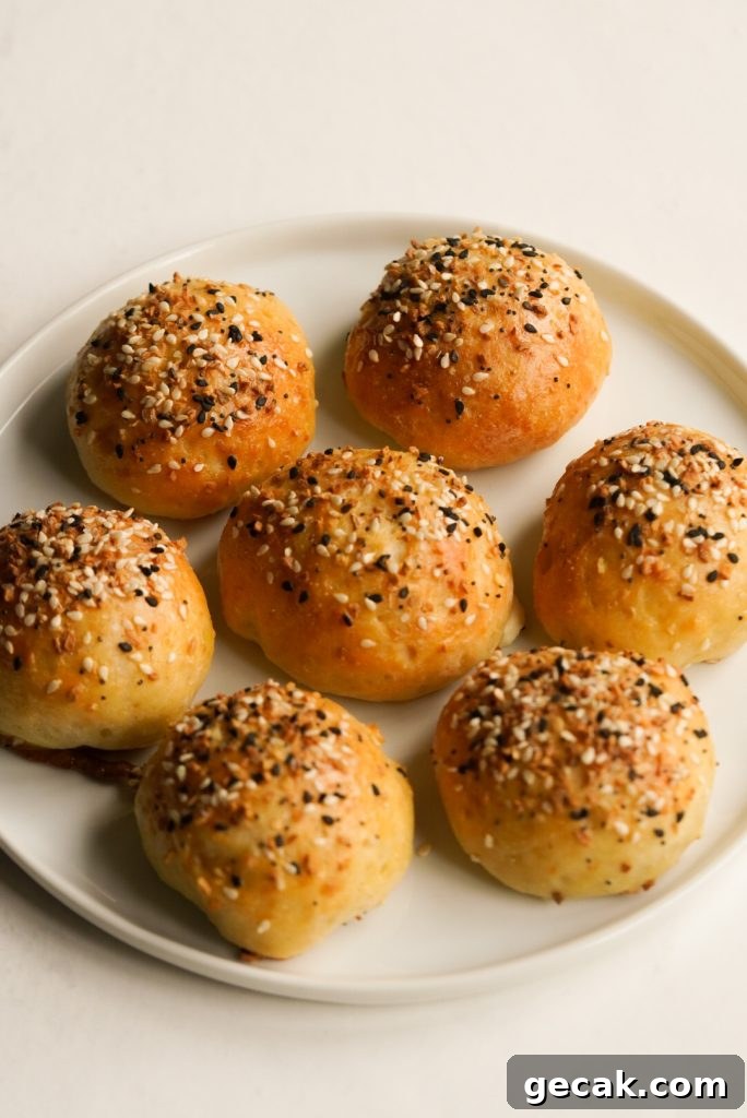 white plate with stuffed bagel bites