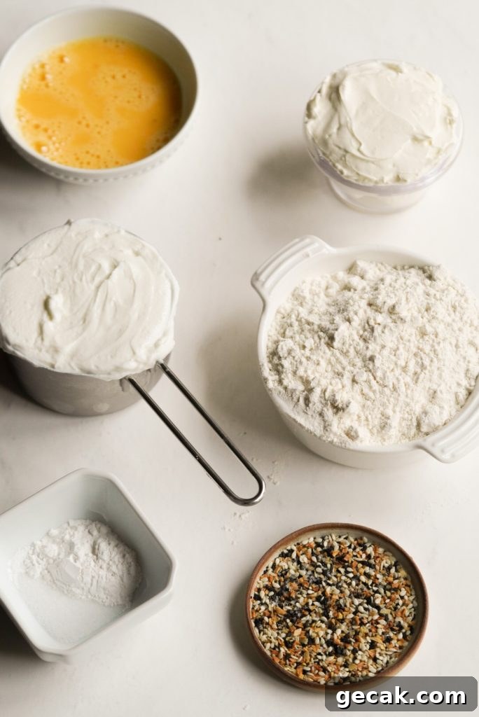 everything bagel bite ingredients measured out on a white table