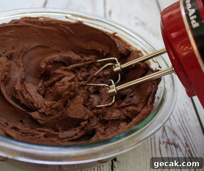 Decadent Whipped Ganache Filling & Frosting for Almond Joy Cake
