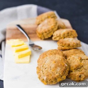 Whole wheat biscuits are flaky and decadent, like you'd expect. What's unexpectedly delicious is the crunch of cornmeal and flavor of cheddar and pepper. Get the easy recipe on RachelCooks.com!