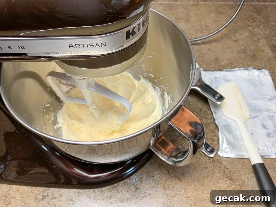 Cream cheese beaten in mixing bowl