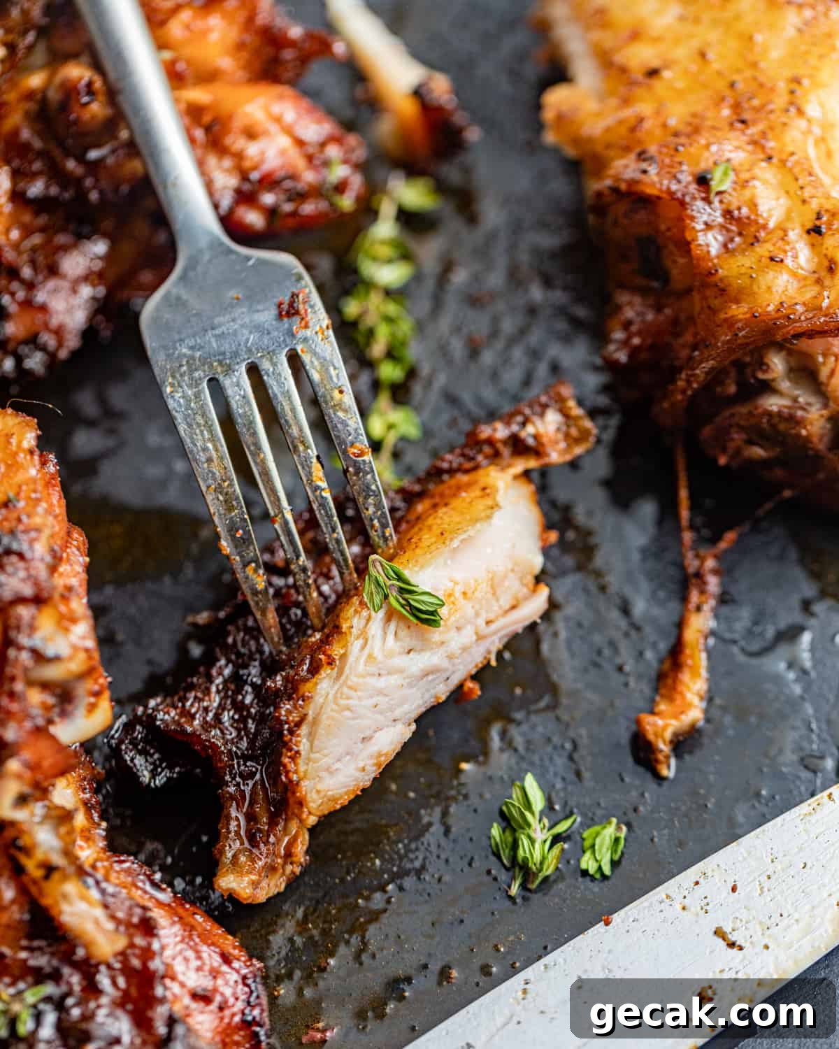 a piece of chicken on a fork.