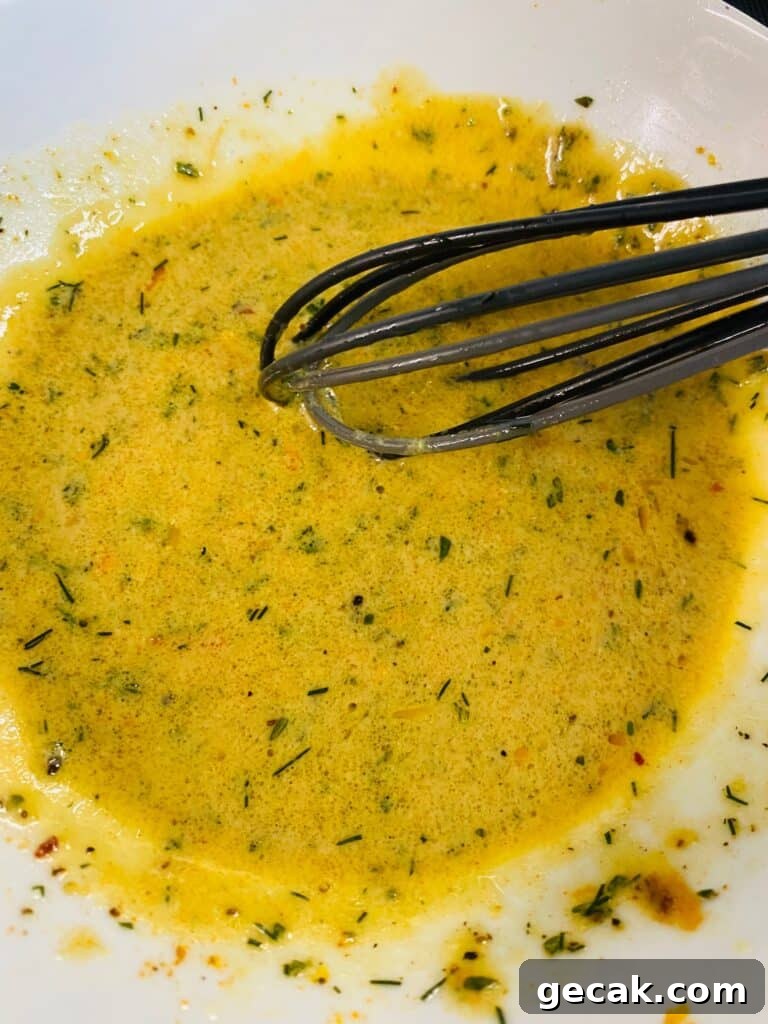 mixing the citrus vinaigrette