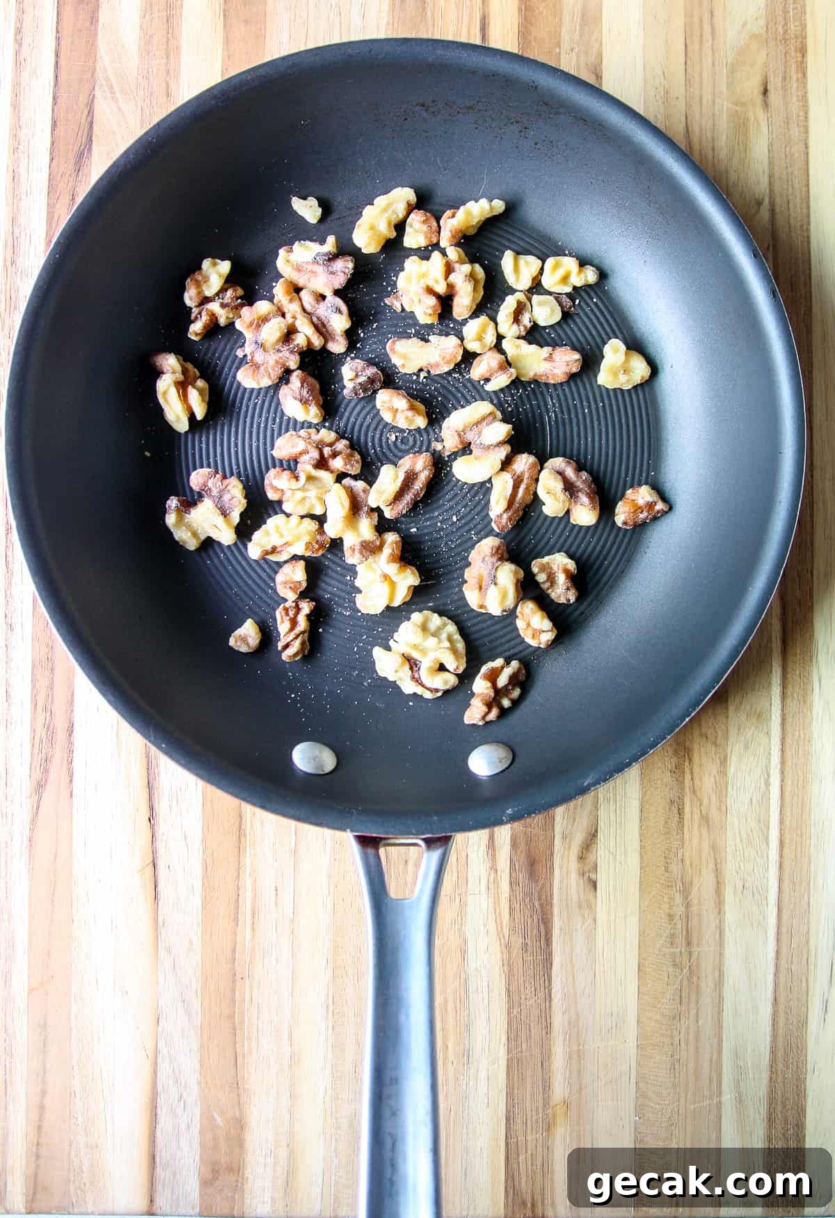 Parsley and Walnut Pesto Recipe: Fresh Homemade Sauce 5 Walnut pieces toasting in a skillet.