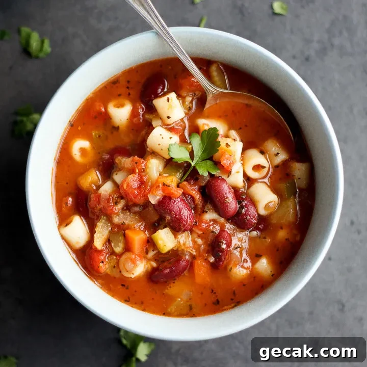 Minestrone Soup in a bowl with a spoon