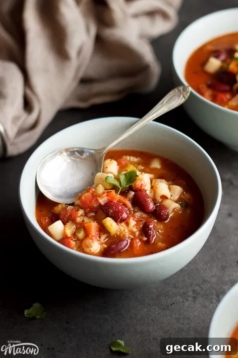 Minestrone Soup in a bowl with a spoon