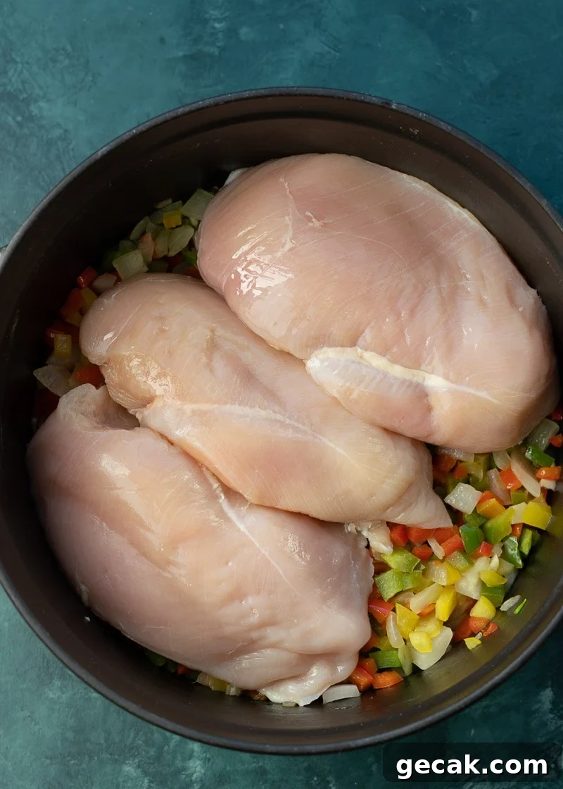 This delicious Chicken Fajita Soup is full of flavor and under 7 net carbs! Tender veggies, a spicy broth, and juicy chicken make this the BEST soup this season!