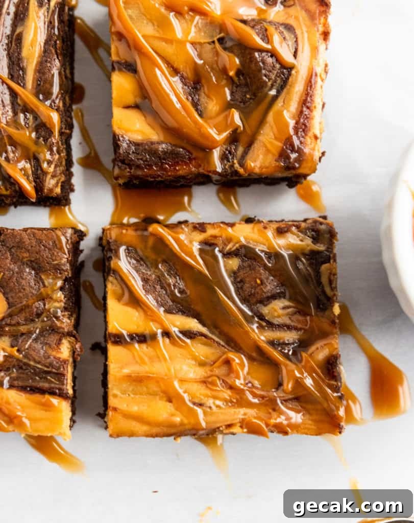 Salted Dulce de Leche Cream Cheese Brownies Recipe 5 Close up of Cheesecake swirl brownies with dulce de leche drizzle