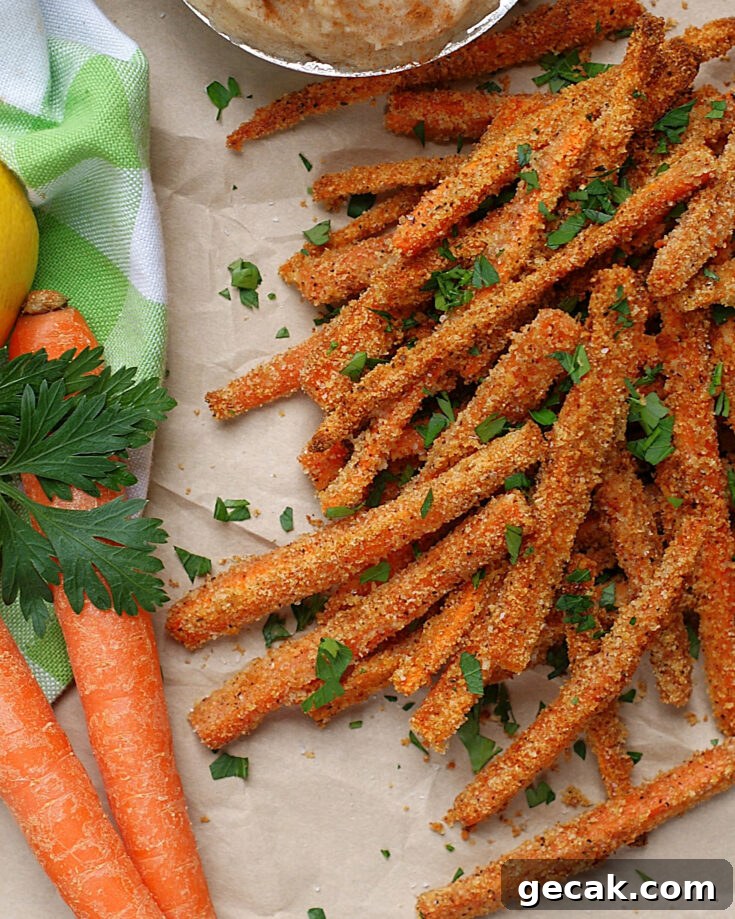 Crispy Garlic Parmesan Garlic Fries topped with parsley.