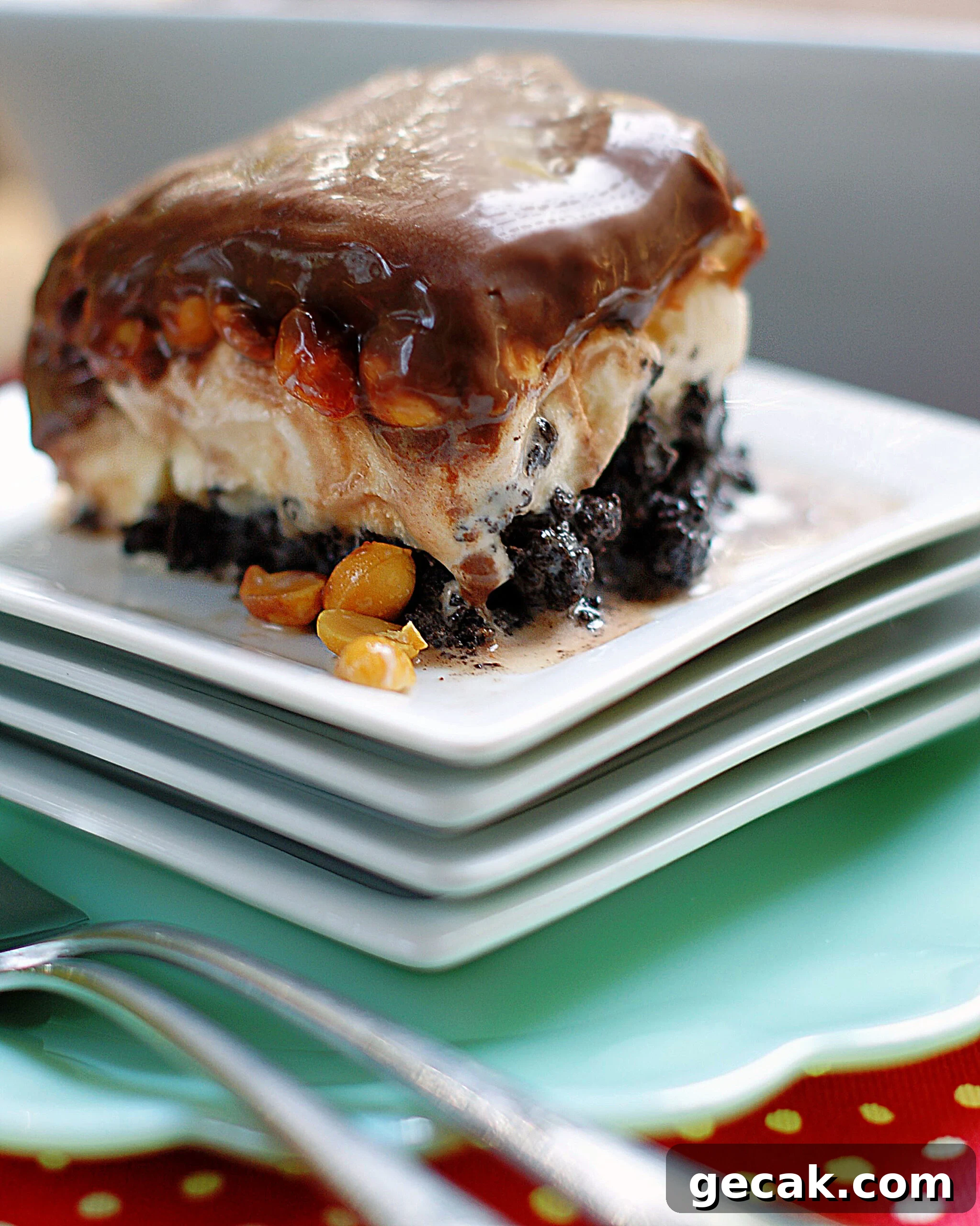 An upclose photo of a slice of Buster Bar Ice Cream Dessert.
