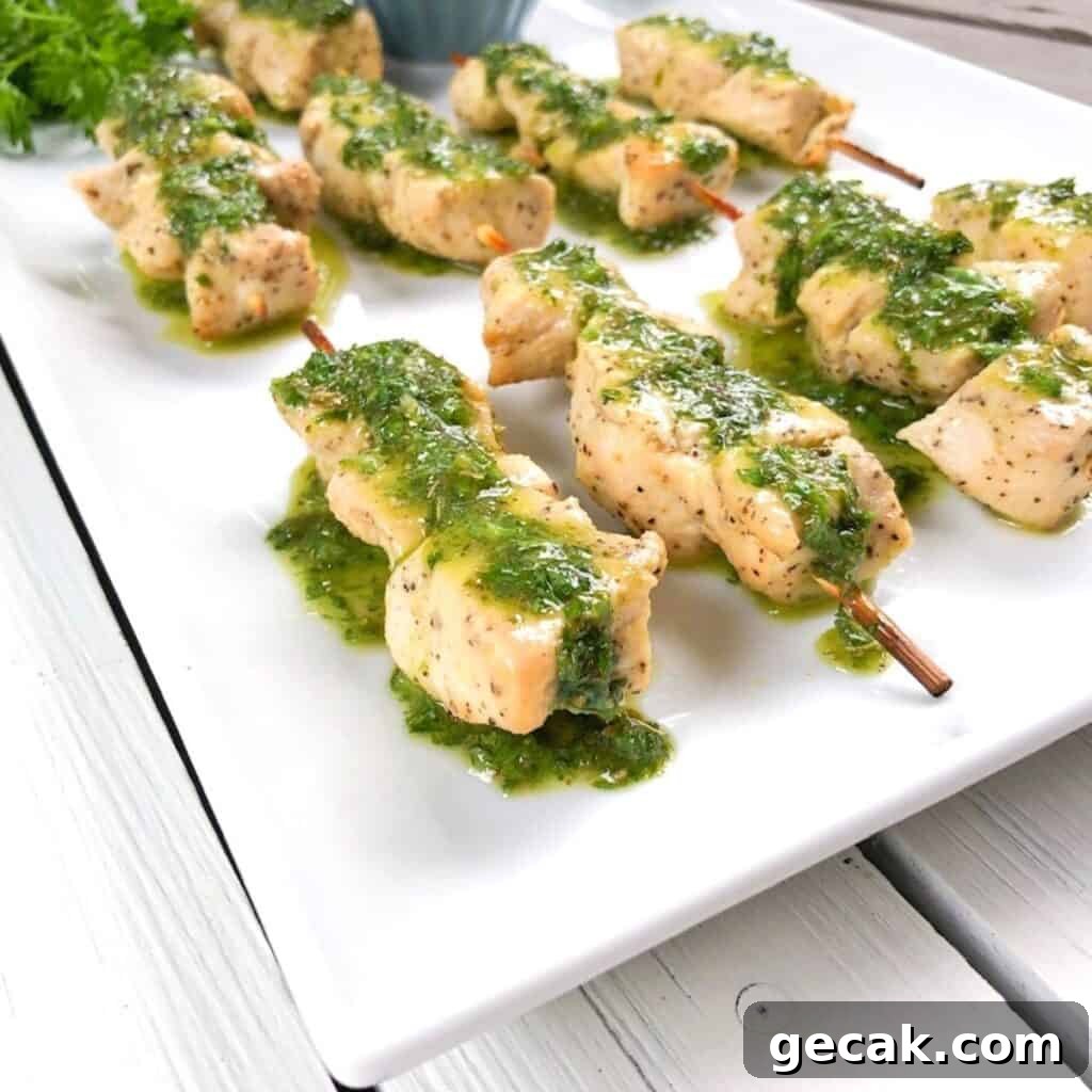 baked chicken kabobs on a plate.