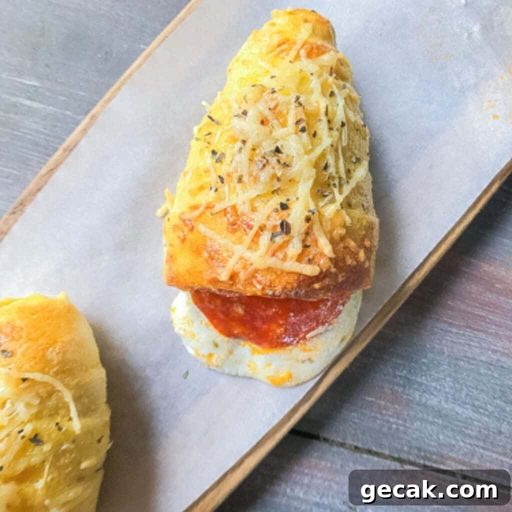 Pizza cone on a board with cheese oozing out.