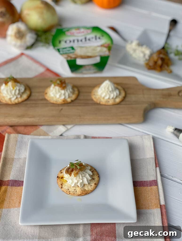 cheese and crackers on table.