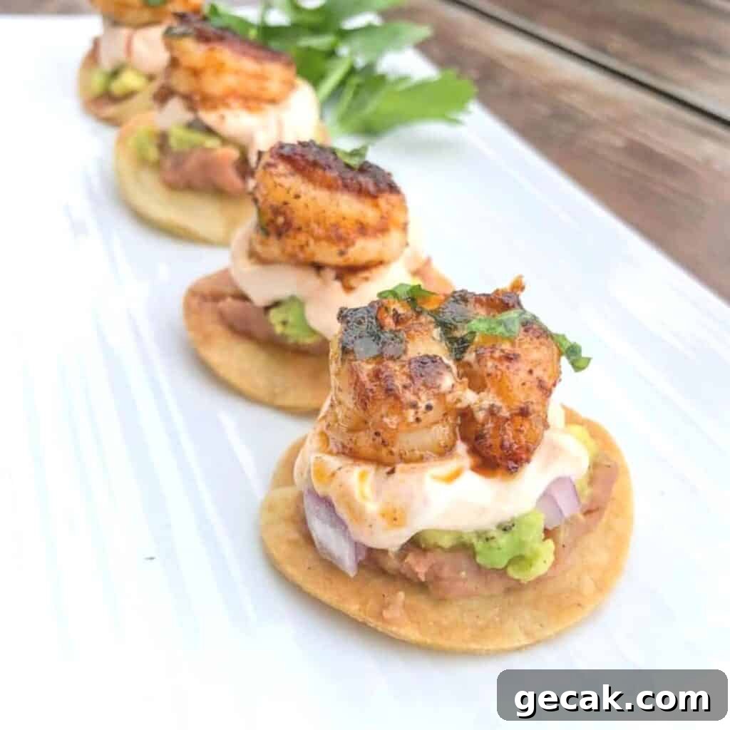 mini shrimp tostadas bites lined on a plate