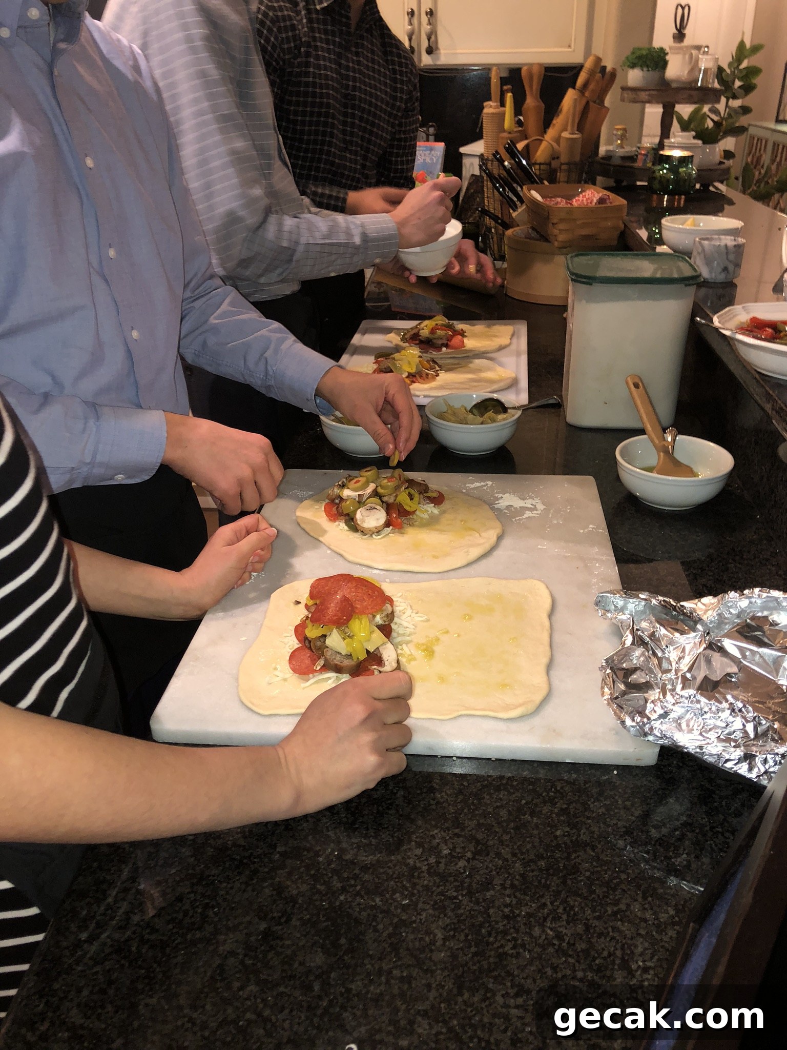 Making homemade calzone with toppings