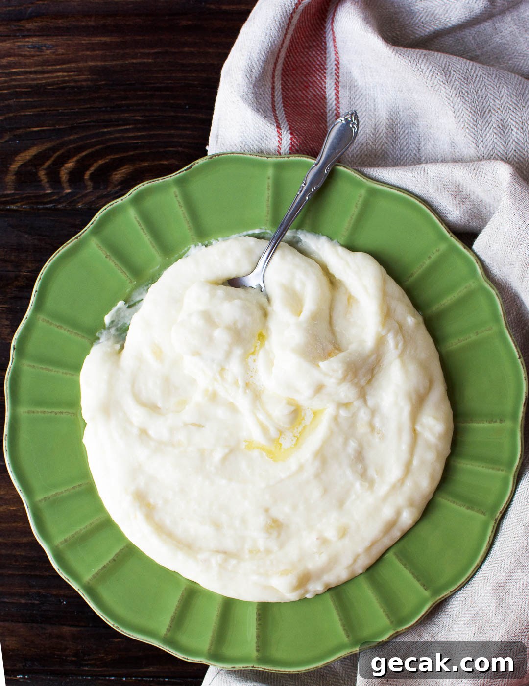Mashed yuca in a green bowl