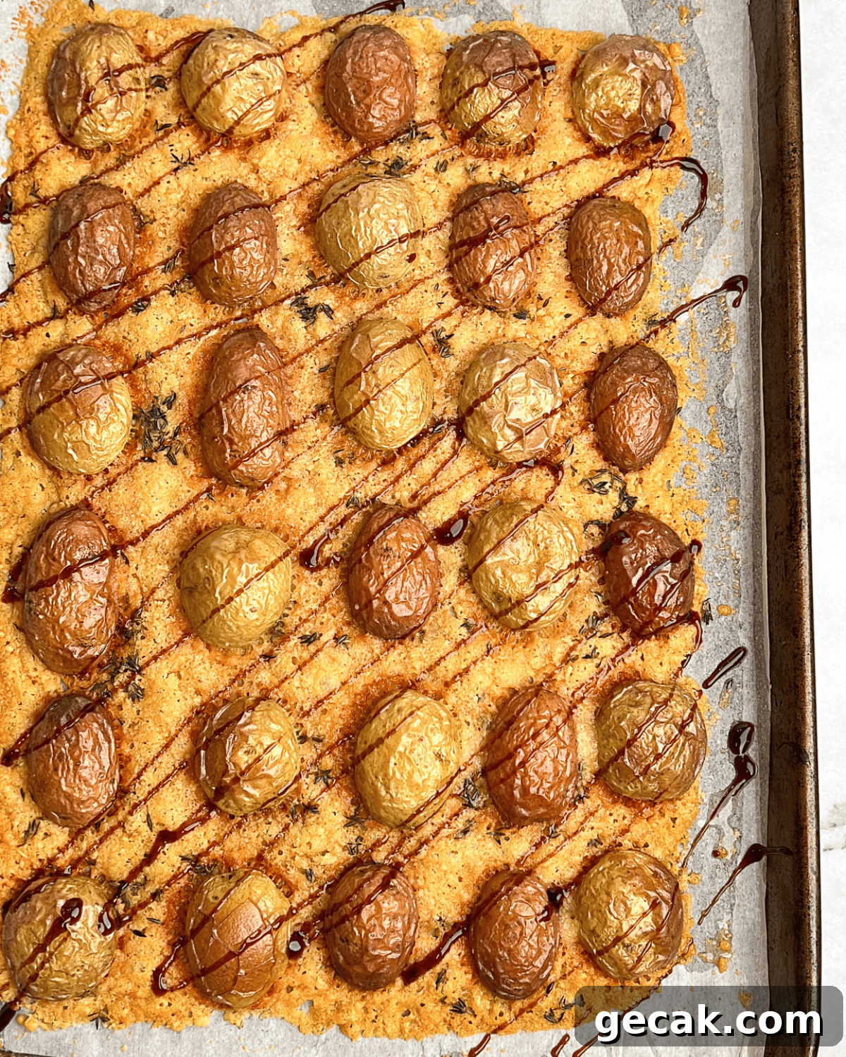 parmesan potatoes drizzled with balsamic glaze
