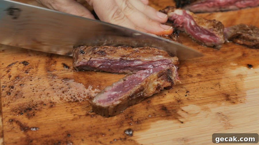 Cutting cooked skirt steak for fajitas
