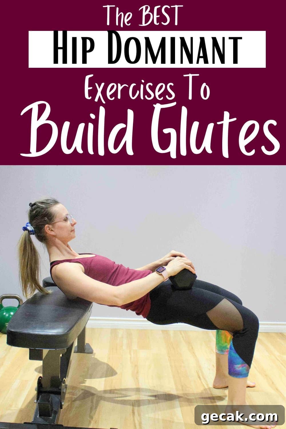 Pin image with text: woman in maroon shirt and black tights performing a hip thrust off a workout bench with a dumbbell in her lap.