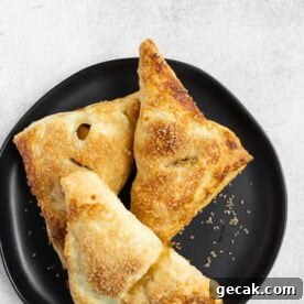easy apple turnovers on a black plate