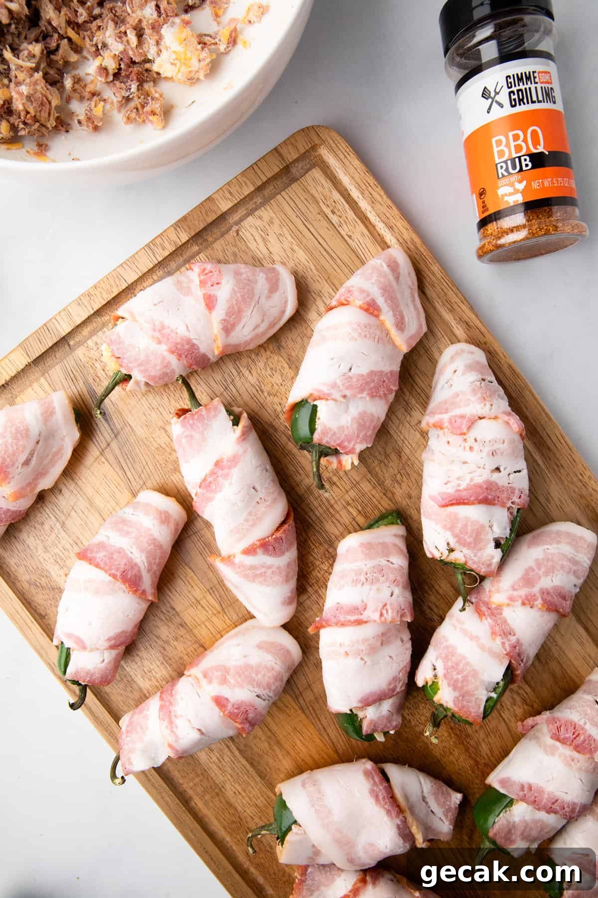 Wrapping stuffed jalepenos wtih bacon for Texas Twinkies