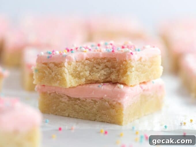 Soft frosted sugar cookie bars with bite