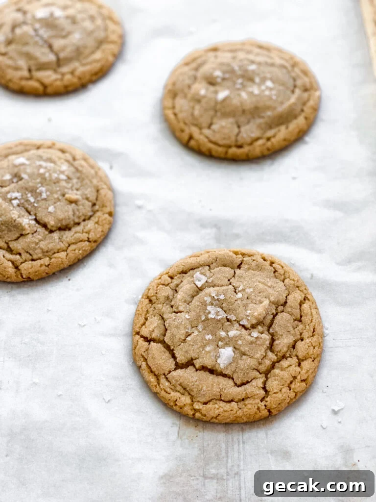 side view of small batch peanut butter cookies on baking sheet